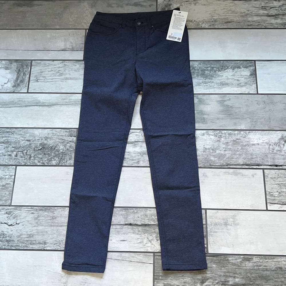 Blue ABC slim pant by Lululemon. Heathered navy. Size 28, 34 inch length.